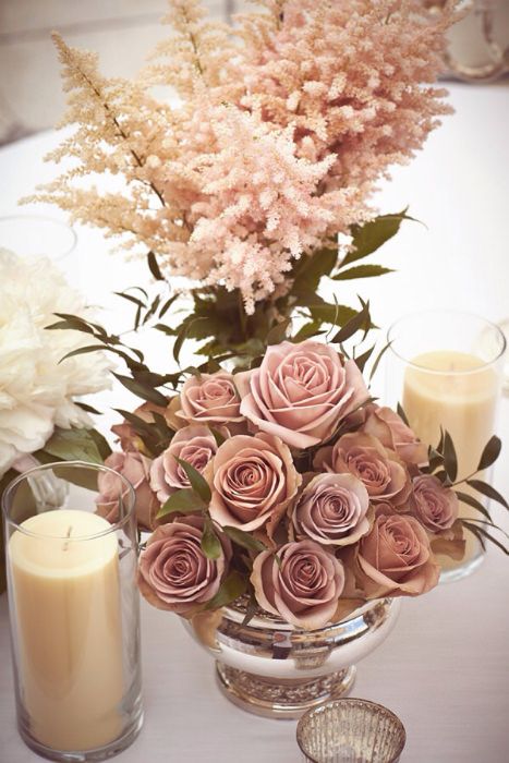 Bring Italian charm to your table with these beautiful delicate roses. Photo Source: Belle & Chic. #centerpiece #roses #candles Rose Gold Centerpiece, Dusty Rose Wedding Colors, Gold Wedding Centerpieces, Flowers And Candles, Dusty Pink Weddings, Deco Champetre, Mauve Wedding, Gold Centerpieces, Tafel Decor