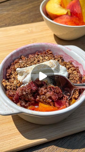 74K views · 5.5K likes | Carley Patterson, RHN on Instagram: "LIGHTENED UP PEACH CRISP 🍑 

Who doesn’t love a single serving dessert recipe ?! 
This peach crisp recipe uses minimal ingredients and is the perfect “better for you “ summer treat ! 

Here’s what you’ll need:

1 small peach, diced 
1 tsp maple syrup 

For the crumble:

1/4 cup oats 
1 tbsp. crushed walnuts 
1/2 tsp. cinnamon 
1/2 tbsp. maple syrup 
1-2 tbsp. almond milk 

Preheat your oven to 350 F. Mix together the diced peaches and one tsp. maple syrup. Add the peaches to a small baking dish or ramekin. Set aside and make the crumble! 
Add to a bowl the oats, walnuts, cinnamon, maple syrup, and almond milk. Combine until a crumble forms. Spoon this mixture of the peaches and press down with your spoon. Bake for 10 minutes at Peach Crisp Recipe, Rice Cake Recipes, Peach Crisp, Single Serve Desserts, Crisp Recipe, Single Serving, Rice Cakes, Summer Treats, Baking Dish