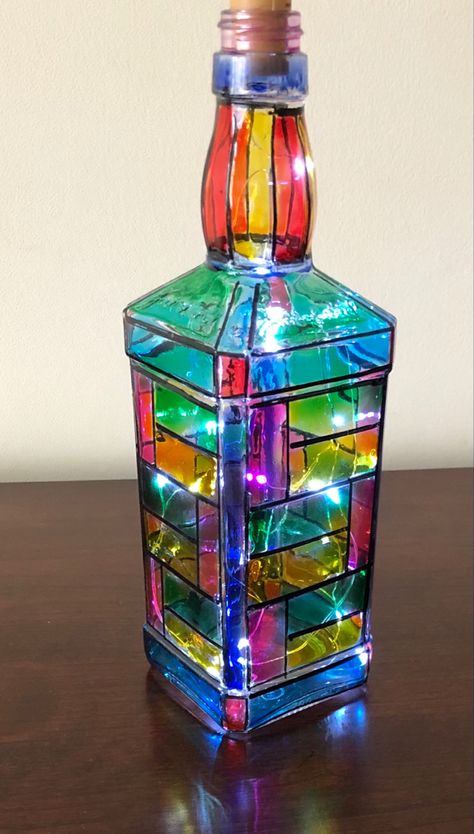 Bottle art , painted bottles , stain glass effect , altered bottle Craft Ideas For School, Waste Craft Ideas, Creative Project Ideas, Craft Ideas Easy, Glassware Crafts, Glass Painting Patterns, Hand Painted Wine Bottles, Glass Bottle Diy, زجاج ملون