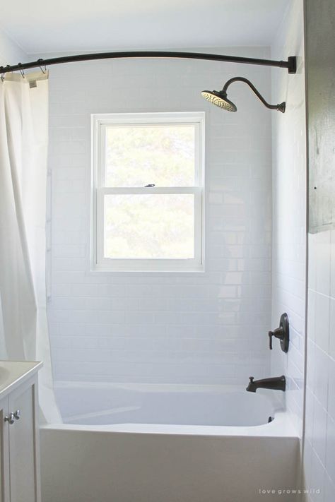 This tub and shower gets a total transformation! See how @BathFitter gave this old farmhouse bathroom a fresh, new look. (via LoveGrowsWild.com) #GetBathFitted #ad Small Bathroom With Window, Bathroom Windows In Shower, Shower Window, Bathtub Surround, Mold In Bathroom, Window In Shower, Bathtub Tile, Bathtub Remodel, Shower Installation