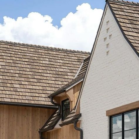 Kelly Ladwig - Nashville Realtor on Instagram: "Let’s talk home exteriors.
I am a huge proponent of mixing a couple of different materials and textures on your home exterior. Think Hardie board and brick or stone and stucco more and more of my clients are wanting to use wood or a wood type of product on the exterior which I absolutely love.
Layering these things together gives your home such a depth it just doesn’t have with one material. 
.
Giving us a master class in a materials mix is this home featured in the upcoming @pcshowcaseofhomes in Park Ciry, Utah. @designwithmaven mixed together wood and painted brick and that cedar shake roof to create a home that’s just magical. What’s your favorite part?
.
Design: @designwithmaven 
Featured in: @pcshowcaseofhomes 
.
#homeexterior #homeinspi Mixed Material Home Exterior, White Brick With Cedar Shake Siding, Stucco And Cedar Shake Exterior, Brick With Cedar Shake Siding, Stucco House With Wood Accents, Stucco And Wood Exterior, Brick House Metal Roof, Cedar Shake Siding Accent With Brick, Brava Cedar Shake Roof