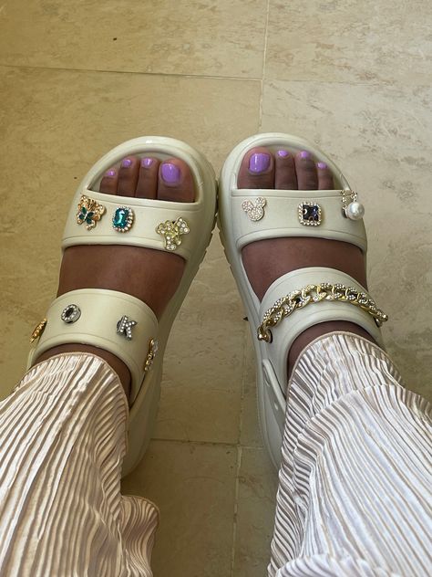 the crocs mega crush sandal on feet Cozzzy Croc Sandals, Crocs Sandals Jibbitz, Croc Crush Sandal, Croc Sandals With Charms, Crocs Mega Crush Sandal With Charms, Crocs Slides Jibbitz Ideas, Crocs Crush Sandals Outfit, Croc Mega Crush Sandal Outfit, Mega Crush Sandals Outfit