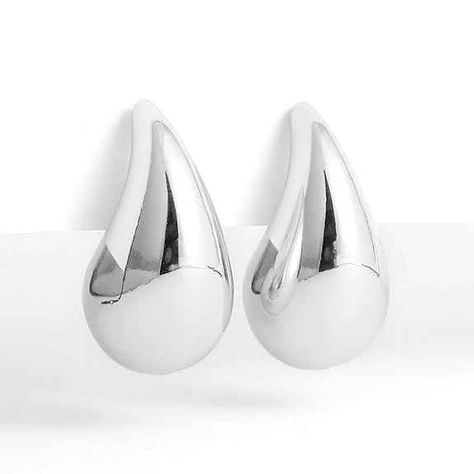 Buy Silver Cascade Teardrop Earrings exclusively on www.shopperspointindia.com Discover the elegant simplicity of our Silver Cascade Teardrop Earrings. Expertly crafted with high-quality silver, these earrings feature a delicate cascade design that adds a touch of sophistication to any outfit. Perfect for any occasion, these earrings elevate your style with their timeless beauty. #silverearrings #teardropearrings #dangleearrings #giftideasforher #jewelryoftheday #timelessjewelry #versatilejew... Cascade Design, Timeless Jewelry, Elevate Your Style, Teardrop Earrings, Timeless Beauty, Your Style, Silver Earrings, Dangle Earrings, India