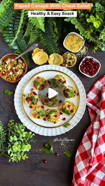 Ritu Khemka on Instagram: "Papad Basket Chaat🤤 Whether you call it basket or katori these papad canapés are so easy to make, crunchy and gluten-free😍 Fill the canapés with healthy chaat made with colorful veggies, chatpata chat masala, tangy & spicy chutney 😋😍 📌 Save & Share the recipe! Follow @thehealthyrasoi for more Recipe for chaat:- In a bowl add 1/4 cup each finely chopped cucumber, carrot, onion, tomato, capsicum, boiled potato, 2 tbsp pomegranate seeds, coriander chutney, coriander leaves, 1/2 lemon juice, 1/2 tsp black salt, chaat masala and roasted cumin seeds powder. Mix everything well. Fill the canapés with chaat mixture, garnish with some fine sev, pomegranate seeds and coriander leaves. Serve immediately and enjoy! Canapés inspired by @golus_kitchen_by_tanvigor #pap Basket Chat Recipe, Fiber Veggies, Spicy Chutney, Paneer Sandwich, Chats Recipe, Chat Masala, Coriander Chutney, Healthy Vegetarian Snacks, Colorful Veggies