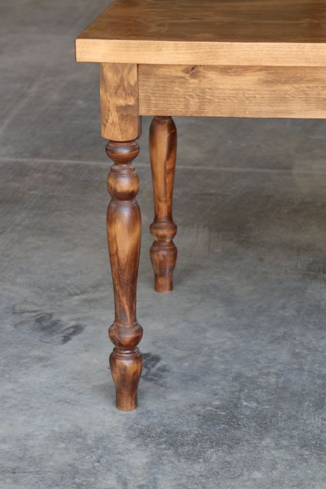 This listing is for an IN STOCK solid wood farmhouse table made from alder wood. This is a handmade, custom item. We ship nationwide to the lower 48 states. Delivery time is currently approximately 1-2 weeks.Table Base:We make the table base to fit in your home with removable legs. This table base features narrow turned and carved wooden legs. It is handmade from local hardwoods and softwoods. Finish: The alder selection is finished with a dark stain and clearcoated. Size/shipping:The pictured t Simple Wood Table Legs, Vintage Farm Table, Wooden Legs For Table, Raw Wood Dining Table, Center Island Table, Narrow Dining Room Table, Carved Table Legs, Wood Farmhouse Table, Large Farmhouse Table