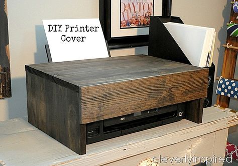 If you prefer to keep your printer out and about, cover the plastic appliance with a stained wooden box to glam up what would otherwise be a total eyesore. See more at Cleverly Inspired » Printer Cover, Printer Storage, Cheap Office Furniture, Office Organization At Work, Loft Ideas, Craft Room Office, Work Organization, Home Office Organization, Office Organization