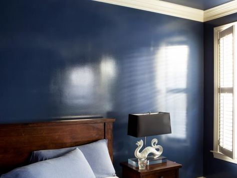 Bring a touch of high style to bedroom walls with a wet effect glossy paint application. Dark Blue Walls, Painting Wood Furniture, Glossy Paint, High Gloss Paint, Gloss Paint, Painting Bathroom, Blue Walls, Wall Paint, Interior Paint