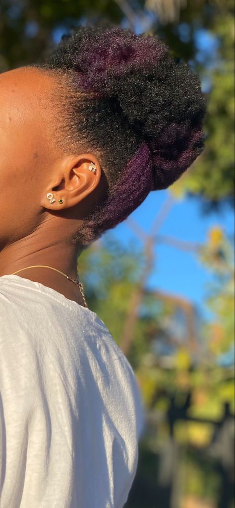 #Shorthair #4chair #skunkstripe #purple #natural #blackgirl #piercings #helical #lobe 4c Purple Hair, Purple 4c Natural Hair, 4c Peekaboo Hair, Peekaboo Natural Hair, Purple Skunk Stripe, Purple Skunk Hair, Hair Inspiration Aesthetic, Purple Peekaboo Hair, Short 4c Hair