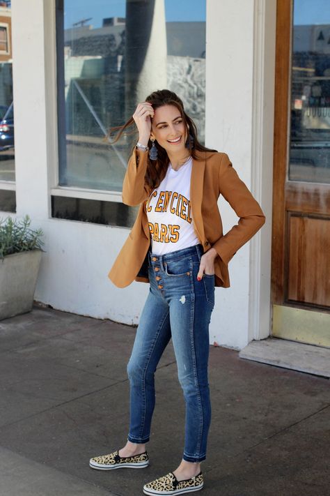 Add a bit of fun to your blazer and jean look with leapard flats, tassel earrings and a bold graphic tee! T Shirt And Blazer Outfit, Blazer And Graphic Tee Outfit, Graphic Tee With Blazer, Fall Blazer, Finally Friday, Anthropologie Jeans, Blazer Outfit, Friday Favorites, End Of The Week