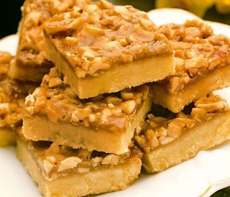 This slice is a classic favourite from our vintage Big Book of Beautiful Biscuits. The delightful caramel peanut topping on a buttery shortbread base makes for one unforgettable slice. Beautiful Biscuits, Caramel Squares, Chocolate Caramel Slice, Peanut Caramel, Retro Desserts, Freezer Friendly Meals, Homemade Scones, Easy Carrot Cake, Caramel Slice