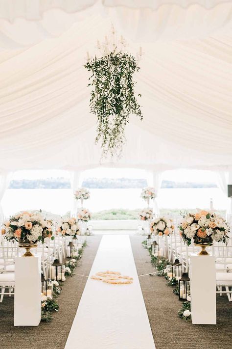 Who doesn't love dramatic greenery hanging over your aisle with a crisp white aisle runner and petals in the shape of your initials? | Flora Nova Design Seattle Romantic Elegant Wedding, Ceremony Arrangement, Seattle Wedding Venues, Washington Seattle, Industrial Wedding Venues, Elegant Wedding Inspiration, Elegant Wedding Reception, Kirkland Washington, Wedding Tent