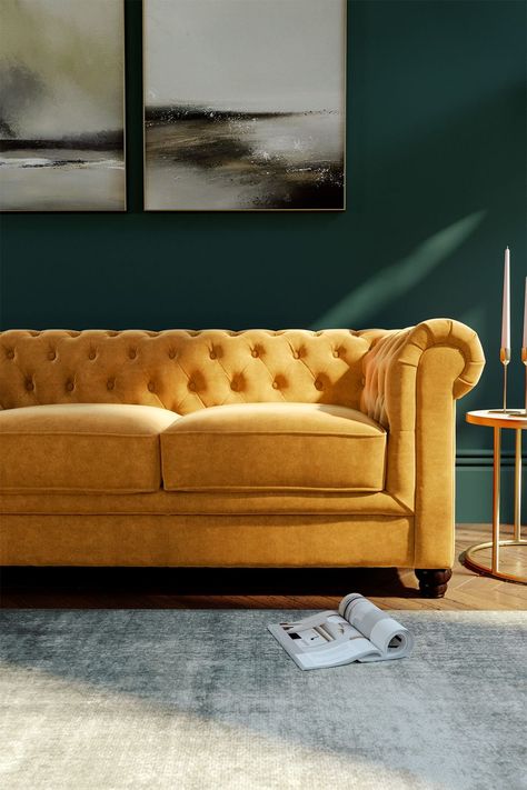 Mustard Chesterfield Sofa, Lime Green Couch Living Room, Mustard Chesterfield Sofa Living Room, Chesterfield Sofa Velvet, Dark Green And Mustard Living Room, Dark Green And Yellow Living Room, Modern Chesterfield Sofa Living Rooms, Emerald And Mustard Living Room, Green Mustard Living Room