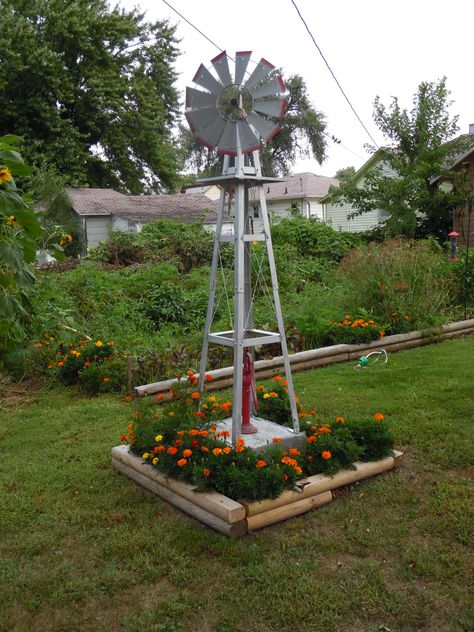 our windmill Windmill Outdoor Ideas, Decorative Yard Windmills, Outdoor Windmill Decor Garden Art, Front Yard Windmill Ideas, Wind Mills Yard Garden Windmill, Garden Windmills Ideas, Windmill Landscaping Ideas, Yard Windmill Ideas, Windmill Garden Ideas