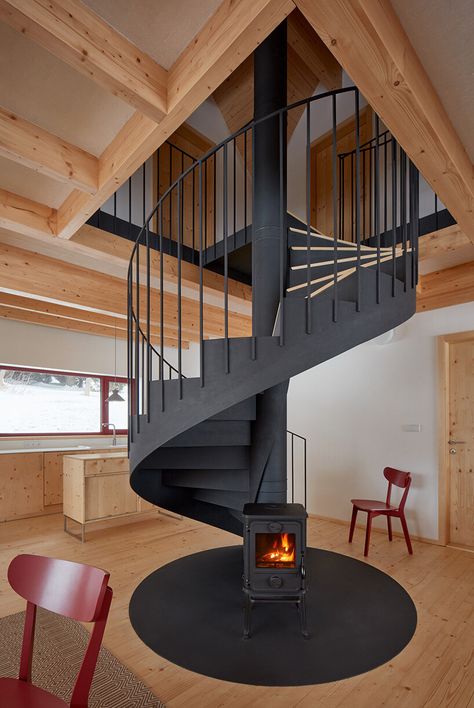 ADR's bučina cottage brings modern design to czech mountains Woodburning Stove, Spiral Stair, Ski Cabin, Light Hardwood, Light Hardwood Floors, Mountain Cottage, Timber Structure, Spiral Stairs, Modern Mountain