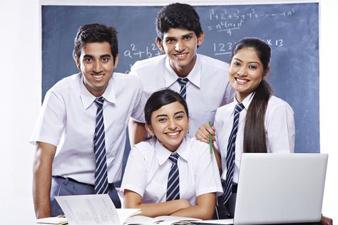 Portrait of four students studying together and smiling School Students Pic, School Students Images, Indian School Students, Teacher And Student Images, Students Photography, Studying Together, Photo Moodboard, School Photoshoot, School Marketing