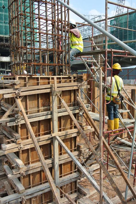 Construction workers fabricating timber column formwork at the construction site stock photography Timber Column, Gifts For Construction Workers, Construction Images, Architecture Blueprints, Civil Engineering Construction, Framing Construction, Construction Engineering, Civil Engineering Design, House Wall Design