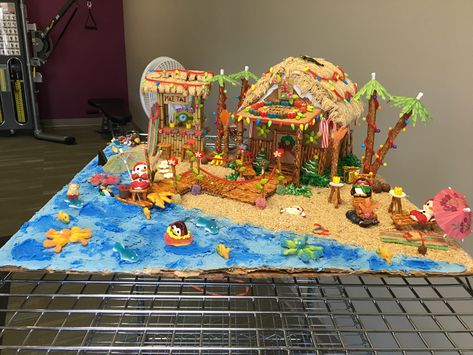 Gingerbread Tiki house Gingerbread Tiki Bar, Tiki Bar Gingerbread House, Tiki Gingerbread House, Gingerbread House Beach Theme, Beach Themed Gingerbread House, Beach Gingerbread House Ideas, Tropical Gingerbread House, Beach Gingerbread House, Gingerbread Beach House