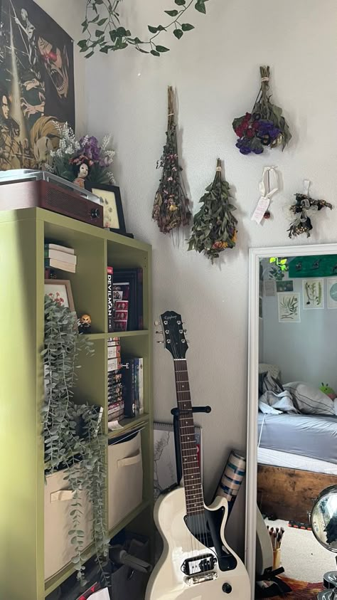 room with plants guitar indie boho green aesthetic forest Green Music Room, Green Music Aesthetic, Indie Apartment Aesthetic, Rock Room Aesthetic, Green Bedroom Aesthetic Indie, Grunge Room Music, Room Ideas Aesthetic Grunge, Guitar Room Aesthetic Dark, Alt Decor