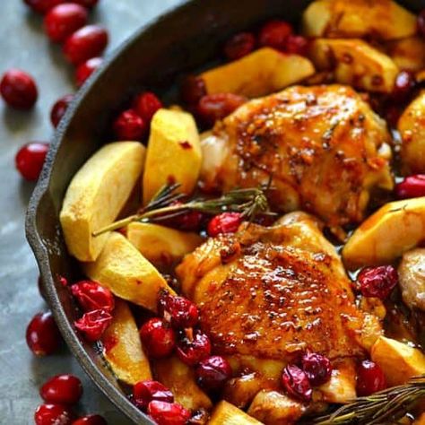 Juicy chicken thighs are roasted in tangy cranberries, soft apples, and covered in a sweet maple glaze for the EASIEST way to do chicken holiday-style! Soft Apples, Chicken With Apples, Maple Glazed Chicken, Juicy Chicken Thighs, Cranberry Chicken, Apple Chicken, Roasted Chicken Thighs, Cooking Healthy, Supper Ideas