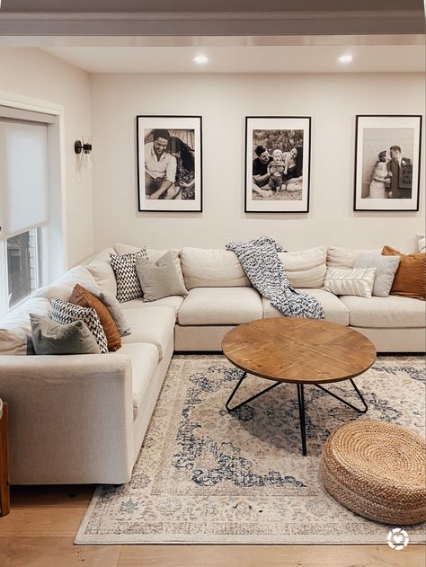 Living room decor. Round wooden coffee table, blue and white floral area rug with a light beige couch. Oversized black gallery prints. Jute floor cushion and brown, blue and green cushion covers. 

Follow my shop @thesamesstyle on the @shop.LTK app to shop this post and get my exclusive app-only content!

#liketkit #LTKunder100 #LTKstyletip #LTKhome
@shop.ltk
http://liketk.it/3qvd2 Beige Couch Living Room, Beige Living Room Decor, Ruang Tv, Beige Couch, Beige Living Rooms, Brown Living Room, Blue Living Room, Decor Home Living Room, Living Room Decor Apartment