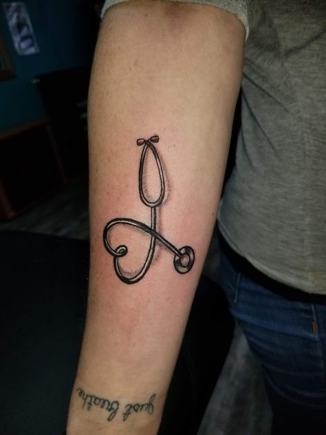 Stethoscope tattoo for nurse Pediatric Nurse Tattoo, Small Stethoscope Tattoo, Nurse Practitioner Tattoo, Tattoos For Nurses, Healthcare Tattoos For Women, Nurse Tattoo Ideas, Nursing Tattoos, Healthcare Tattoo, Spouse Tattoos