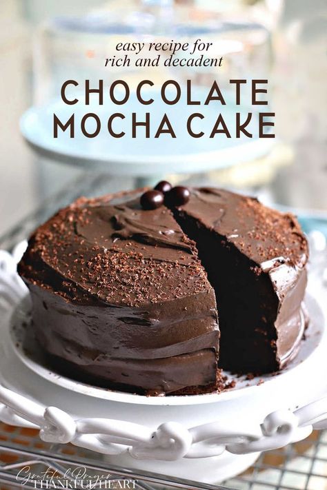 Easy recipe for a dark, rich, chocolate mocha cake with a touch of coffee flavor and covered with fluffy chocolate frosting. It is decadent and a perfect birthday or anniversary celebration dessert that begins with a box mix! Chocolate Box Cake Mix Hacks Coffee, Mocha Fudge Cake, Chocolate Cake With Coffee In It, Dark Chocolate Coffee Cake, Box Mix Cake Recipes, Chocolate Mocha Cake Recipe, Mocha Chocolate Cake, Mocha Cake Recipe, Coffee Flavored Cake