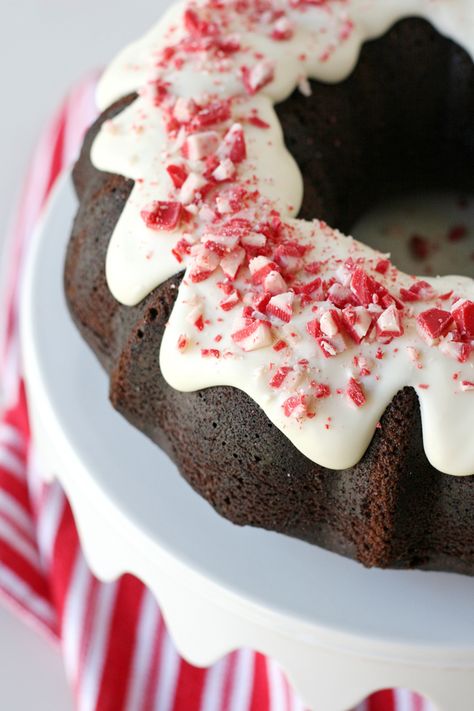 This rich and delicious Chocolate Peppermint Bundt Cake recipe is perfect for the holidays! Simply beautiful and surprisingly simple to make from scratch. Chocolate Peppermint Bundt Cake, Peppermint Bundt Cake, Christmas Bundt Cake, Chocolate Peppermint Cake, Peppermint Cake, New Year's Desserts, Chocolate Bundt, Bundt Cake Recipe, Lemon Bundt Cake