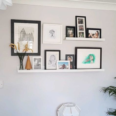 Ikea Picture Ledge 3 Picture Ledge Ideas, Gallery Wall With Photo Ledge, Ikea Photo Shelf, Picture Shelf Display, Ikea Picture Ledge Ideas Living Rooms, Photo Ledge Decor, Offset Picture Ledges, Ikea Picture Shelf Ideas, Ledge Shelves Decorating Ideas