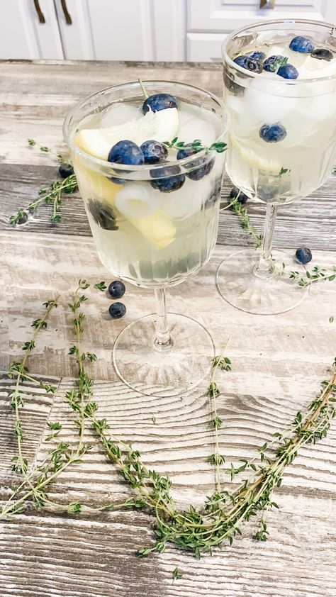 Cocktail Hour: Blueberry Limoncello Prosecco — Champagne & Co | Event Planner in Eastern Ontario Engagement Party Drink, Mama Mia Wedding, Bridal Shower Snacks, Blue Bridal Shower Decorations, Nyc Bachelorette, Blueberry Wedding, Summer Engagement Party, Prosecco Drinks, Blueberry Cocktail