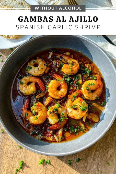 Gambas al ajillo (Spanish garlic shrimp) served in a grey curved in plate. Next to the plate is 2 slices of bread on a white plate. Shrimp Tapas, Shrimp Gambas, Spanish Garlic Shrimp, Chili Garlic Shrimp, Spanish Shrimp, Spanish Tapas Recipes, Sherry Wine, Tapas Recipes, Shrimp Recipes For Dinner