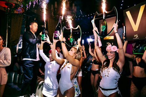 XS Las Vegas Nightclub waitresses holding up Dom Champagne Bottles with sparklers. Bottle Girls Club, Bottle Service Girls, Bottle Service Aesthetic, Bottle Girl Aesthetic, Champagne Sparklers, Vibe Party, Vegas Nightclub, 21st Birthday Themes, Bartender Outfit