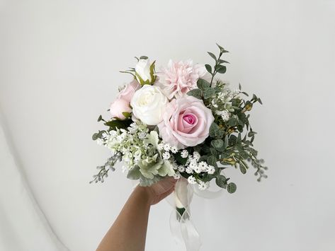 Blush & Greenery Bridal Bouquet 12" Artificial/ Pastel Pink Bouquet / Pink Wedding Bouquet / Rustic Eucalyptus Bouquet/ Dusty Rose Bouquet Bridal bouquet shown measures approximately 12 inches wide. Maid of honor and bridesmaid bouquets measure respectively 9 and 7 inches across. I am using the top quality silk flower and eucalyptus on my work, that the bouquet looks very realistic and stunning.  Coordinating boutonnieres and corsages are available. If you need any matching archway, swag and tieback, garland, cake topper, centerpieces or hairpieces, please message me for a quote.  Tailor made service are available, please send me your ideas for a quote. Sage Green Dusty Rose Wedding Bouquet, Bridesmaid Bouquet Light Pink, Simple Pink Wedding Bouquet, Simple Wedding Bouquet Summer, Pink Wedding Bouquet Ideas, Bridesmaid Flower Bouquets, Pastel Pink Bouquet, Pink And White Rose Bouquet, Bridesmaid Bouquet Ideas