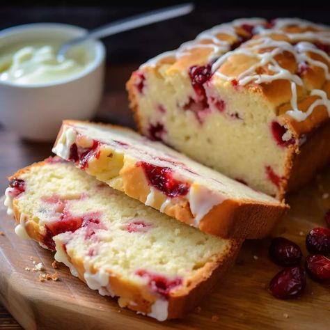 There's something magical about pulling a Cream Cheese Cranberry Loaf out of the oven. The aroma, the warm, comforting sight of golden crust mixed with bursts of cranberry—it's like a hug in loaf form. This Cranberry Bread With Cream Cheese, Panera Orange Cranberry Bread, Lemon Cranberry Bread, Cream Cheese Cranberry Loaf 12 Tomatoes, Cranberry Lemon Loaf, Cranberry Cream Cheese Loaf, Cranberry Cream Cheese Bread, Cream Cheese Cranberry Bread, Cream Cheese Cranberry Loaf