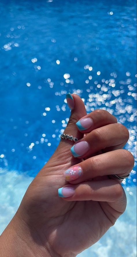 Spring/summer Nails French Tip, Summer Blue French Nails, Summer Nail Ideas Acrylic French Tip, Nails With Flower Tips, Blue French Tip Nails With Flower Design, Nails With French Tip And Flowers, One Nail Flower Design, Summer Nail Designs Flower, Summer Nails Flower French Tip