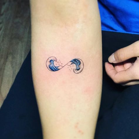 Tiny wave tattoo Wave Tattoo Wrist, Ocean Wave Tattoo, Small Beach Tattoos, Small Wave Tattoo, Wave Tattoo Design, Wave Tattoo, Finger Tattoo Designs, Mini Tattoo, Skeleton Hand Tattoo