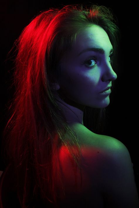 This is a fashion portrait. To take this photo I used three lights with three different coloured gels over the lights. I wanted to create a dramatic mood using colours instead of using facial expressions and poses. I used red, blue and green. I thought that these colours could all communicate something so thats why I chose them. I also used the lighting technique rembrandt lighting by one of the lights being on the right side and up above. I used a black background to make the colours stand out. Fashion Photography Studio, Photography Lighting Techniques, Lighting Angles, Photography Studio Lighting, Studio Photography Fashion, Outdoor Portrait, Portrait Lighting, Studio Photography Lighting, Lighting Techniques