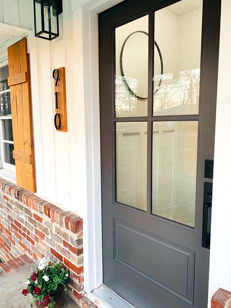 Night Owl Sherwin Williams Front Door, Iron Oar Sherwin Williams Front Door, Front Door Iron Ore Sherwin Williams, Dark Exterior Door, Ranch Style Home Front Door, Back Door Garden Ideas, Sw Iron Ore Exterior Front Doors, Peppercorn Front Door Sherwin Williams, Dark Charcoal Front Door