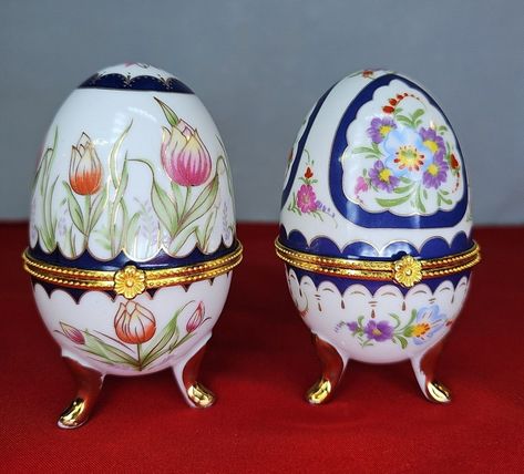 Adorn your space with these elegant Porcelain Egg Trinket Boxes featuring stunning multi-color patterns and delicate gold trimming. The footed design and hinged lid with legs make for a perfect addition to your vanity or side table. #PorcelainEggTrinketBox #GoldTrimming #MultiColorDesign #HomeDecor #VanityEssentials 🔍🏠🌸 Porcelain Eggs, Egg Shape, Hinged Lid, Box Set, Gold Trim, Trinket Boxes, Hinges, Color Patterns, Jewelry Box