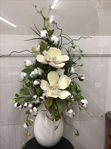 11117- cream magnolias in vase with cotton, curly willow and mixed greenery Magnolia Arrangements Silk Flowers, Magnolia In Vase, Floor Vase Arrangement, Artificial Flowers In Vase, Magnolia Centerpiece, Tall Floral Arrangements, Modern Flower Vase, Large Floral Arrangements, Spring Flower Arrangements