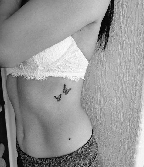 Tattoo Female Side Ribs, Ribcage Small Tattoos, 3 Butterfly Rib Tattoo, Tattoo Ideas For Women Side Rib, Small Flower Tattoo On Ribs, Tattoos Down The Side Of Ribs, Mid Rib Tattoo, Butterfly Tattoo On Side Of Stomach, Ribcage Bird Tattoo