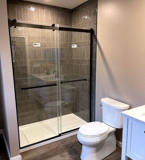 This shower being a part of a larger bathroom remodel in #sheltonct is a good demonstration of using a fiberglass shower pan to keep costs lower but still having the shower walls tiled to personalize the space. #remodeling #homeremodeling #remodelingideas #bathroomremodeling White Shower Pan With Tile Walls, Shower Pan With Tile Walls, Replace Shower Insert With Tile, Black Shower Base With Tile Walls, Acrylic Shower Pan With Tile Walls, Prefab Shower Pan With Tile Walls, Large Bathroom Remodel, Fiberglass Shower Pan, Fiberglass Shower