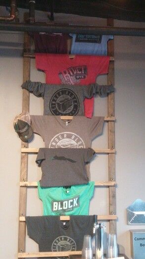 Beer apparel ladder Tee Shirt Display Ideas, Apparel Display Ideas, Tee Shirt Display, Shirt Display Ideas, Merch Display Ideas, T Shirt Display Ideas Retail, Tshirt Display Ideas Retail, Apparel Display, Merch Display