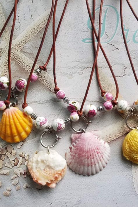 Step onto the sun-drenched shores of creativity as we embark on a captivating journey through “25 DIY Seashell Crafts That Bring the… Sea Shell Diy Jewelry, Shell Necklace Diy Seashell Jewelry, Unique Handmade Shell For Jewelry Making, Beachy Shell-shaped Shell Necklace For Beach Season, Handmade Shell-shaped Necklace For Beach Season, Charleston South Carolina Vacation, Beach Season Shell-shaped Jewelry, Seashell Mobile, Seashell Napkin Rings