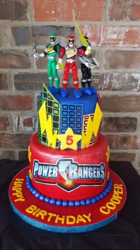 These 13 Power Rangers Party Ideas will kick your superhero party into high gear. Get ideas for cakes, favors, desserts, invites, and more! Power Rangers Ninja Steel Cake, Power Rangers Cake Ideas, Power Rangers Birthday Party Ideas Cake, Power Rangers Cakes For Boys, Power Ranger Party Ideas, Power Ranger Birthday Cake, Power Rangers Birthday Party Ideas, Power Rangers Birthday Cake, Power Rangers Cake