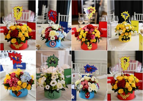 Super Heroes floral centerpiece Marvel Wedding Table Decorations, Marvel Quinceanera Theme, Comic Book Centerpieces, Super Hero Wedding Theme, Marvel Wedding Decorations, Avengers Themed Wedding, Marvel Wedding Centerpieces, Super Hero Centerpiece, Marvel Centerpieces