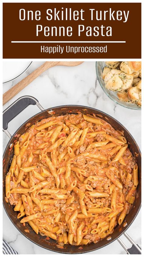 A large skillet of penne pasta in a creamy cheesy tomato sauce with lean ground turkey Ground Turkey And Heavy Cream, Ground Turkey With Pasta Recipes, Healthy Pasta With Ground Turkey, Ground Turkey Pasta Bake Healthy, One Pot Turkey Pasta, Easy Ground Turkey Pasta Recipes, Pasta Ground Turkey Recipes, Ground Turkey Penne Pasta, Turkey Meat Pasta Recipe