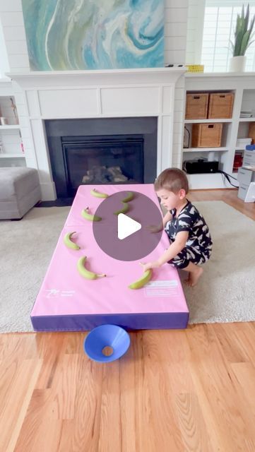 Lindsey BenGera | Sprinkle in Learning® on Instagram: "Banana Challenge 🍌

Bananas not quite ripe yet? Give this fun trial and error activity a try.  It was fun watching my sons ‘wheels’ turn as he planned each move to finally get the ball in the cup. 

We used our incline mat from @kangaroohoppers.offical. It worked like a charm, but you can use any ramp-like surface. 

#ad #sponsored #kangaroohoppers #inclinemat #bananas #banana #trialanderror #activitiesforkids #activityforkids #kidsactivity #kidsactivities #simpleplay #playtime #simpleplayideas #easyplay #indoorplay #indoorplayideas #preschoolgames #preschoolactivities #prek #stickwithit #momlife #timetoplay #funchallenge #challengeforkids #toddleractivity #homeschool #homeschoolmom" Banana Activities For Kids, Banana Activity, Banana Games, Trial And Error, My Sons, Preschool Games, Diy Games, Indoor Play, Fun Challenges