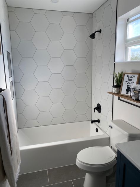 Hexagon Bathroom Shower Tile, Hex Tile Bathroom Wall, Bathroom Tiles Hexagon, Hexagon Subway Tile Bathroom, Kids Bathroom Tiles Ideas, Small Hexagon Tile Bathroom Wall, Hexagon Tiles Shower Wall, Large Hexagon Tile Shower Wall, Hexagon Tile In Shower Wall