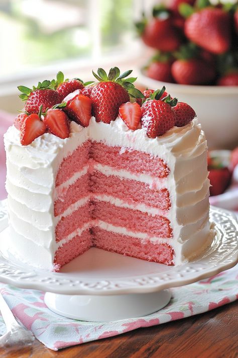 Experience the delight of The Best Strawberry Cake Ever, bursting with the fresh flavors of real strawberries. This moist, tender cake topped with a creamy frosting is a colorful centerpiece for any celebration or summer gathering. #StrawberryCake #SummerDessert #CakeLovers Strawberry Stack Cake, Strawberry Cake For Birthday, Cake With Strawberry Decoration, Strawberry Crumble Cake Recipe, Strawberry Flavored Cake, Best Strawberry Cake Ever, Strawberry Smash Cake, The Best Strawberry Cake, Fluffy White Cake