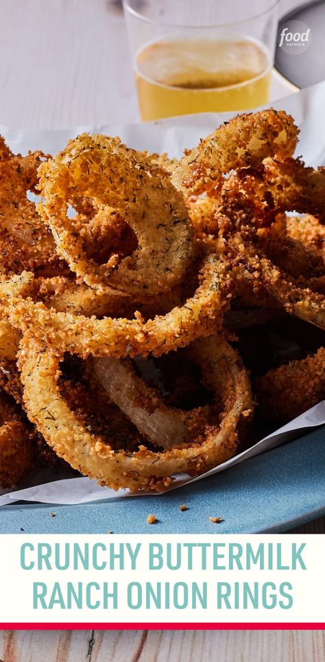 Recipe of the Day: Crunchy Buttermilk Ranch Onion Rings 🧅 No more soggy onion rings! The addition of cornstarch to the coating for these tasty rings helps them maintain an irresistible, crispy, crunchy exterior. Both the buttermilk soak and panko breading are spiked with ranch seasoning, so the flavor really stands out, too. We pair them with a speedy lemon aïoli, but you could serve them any condiment you prefer. Blooming Onion, Buttermilk Ranch, Fall Cooking, Ranch Seasoning, Vegetable Sides, Appetizer Dips, Onion Rings, Recipe Of The Day, Lunch Recipes